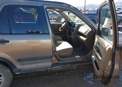 2004 Honda Cr-V Ex z USA, uszkodzony, nr VIN JHLRD78884C057892